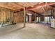 Spacious unfinished basement with exposed beams, wiring, and a concrete floor, ready for customization at 2180 Wappoo Hall Rd, Charleston, SC 29412