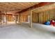Large unfinished basement with exposed framework and ample space for potential development at 2180 Wappoo Hall Rd, Charleston, SC 29412