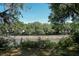 Scenic waterfront view with mature trees and river access, ideal for nature lovers at 2180 Wappoo Hall Rd, Charleston, SC 29412