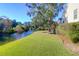 Beautiful waterfront backyard with green lawn and scenic views at 2206 Magnolia Meadows Dr, Mount Pleasant, SC 29464