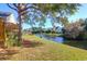Expansive backyard with lush greenery, leading to a scenic waterfront at 2206 Magnolia Meadows Dr, Mount Pleasant, SC 29464
