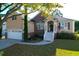 Beautiful home with a two-car garage, brick and stucco accents, and a charming front entrance at 2206 Magnolia Meadows Dr, Mount Pleasant, SC 29464