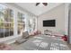 Bright sunroom featuring lots of windows and playing space at 2206 Magnolia Meadows Dr, Mount Pleasant, SC 29464