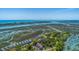 Quaint condo community surrounded by mature trees, ponds, and scenic waterfront and marsh views at 221 E Mariners Cay # 221, Folly Beach, SC 29439