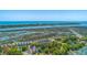 Well-maintained condo community boasting tennis courts, mature landscaping, and stunning waterfront vistas at 221 E Mariners Cay # 221, Folly Beach, SC 29439
