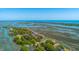 Waterfront condo community surrounded by mature trees and offering beautiful water and marsh views at 221 E Mariners Cay # 221, Folly Beach, SC 29439