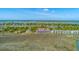 Spectacular aerial view of waterfront community boasting natural beauty of the marsh and surrounding area at 221 E Mariners Cay # 221, Folly Beach, SC 29439