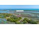 Waterfront condo community at 221 E Mariners Cay featuring scenic marsh views and lush landscaping at 221 E Mariners Cay # 221, Folly Beach, SC 29439