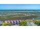 Coastal condos with tennis courts and stunning views of the marsh and ocean at 221 E Mariners Cay # 221, Folly Beach, SC 29439