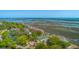 Beautifully landscaped condo community featuring mature trees, ponds, and tennis courts at 221 E Mariners Cay # 221, Folly Beach, SC 29439