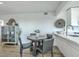 Inviting dining area featuring modern decor, creating a comfortable and stylish space at 221 E Mariners Cay # 221, Folly Beach, SC 29439