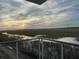 Scenic marsh view from a balcony, showcasing waterfront living and beautiful horizon at 221 E Mariners Cay # 221, Folly Beach, SC 29439