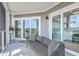 Relaxing outdoor patio featuring comfortable seating and seamless access to interior living spaces through sliding glass doors at 221 E Mariners Cay # 221, Folly Beach, SC 29439