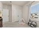 Neutral bedroom features plush carpet, a window with blinds, and ample closet space at 226 Midtown Ave, Summerville, SC 29486