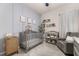 Cozy Bedroom features a crib, changing table, and a comfortable chair at 226 Midtown Ave, Summerville, SC 29486