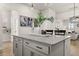 Elegant kitchen island with white cabinetry, quartz countertops, and stylish decor at 226 Midtown Ave, Summerville, SC 29486