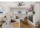 Bright living room with comfortable seating, modern fireplace, and large windows at 226 Midtown Ave, Summerville, SC 29486