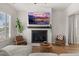 Cozy living room showcasing a modern fireplace, comfortable seating and elegant decor at 226 Midtown Ave, Summerville, SC 29486