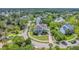 Aerial shot showcasing a two-story home nestled within a neighborhood, surrounded by lush greenery at 2269 Hartfords Bluff Cir, Mount Pleasant, SC 29466