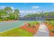Community basketball and tennis courts are surrounded by landscaping and a walking path at 2269 Hartfords Bluff Cir, Mount Pleasant, SC 29466