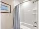 Bathroom featuring a classic tub and shower combo with white subway tile and matching shower curtain at 2269 Hartfords Bluff Cir, Mount Pleasant, SC 29466