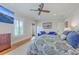 Bedroom with hardwood floors, ceiling fan and seating at 2269 Hartfords Bluff Cir, Mount Pleasant, SC 29466