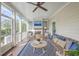 Relaxing covered porch featuring a fireplace and comfortable seating area at 2269 Hartfords Bluff Cir, Mount Pleasant, SC 29466