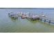 Dock featuring boat slips and a ramp, providing access to the water for boating and recreation at 2269 Hartfords Bluff Cir, Mount Pleasant, SC 29466