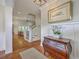Inviting foyer with staircase, hardwood floors, and traditional furnishings at 2269 Hartfords Bluff Cir, Mount Pleasant, SC 29466