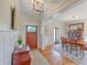 Elegant foyer with hardwood floors, detailed trim, and access to dining area at 2269 Hartfords Bluff Cir, Mount Pleasant, SC 29466