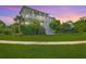Charming two-story home with inviting front porch and well-manicured lawn at 2269 Hartfords Bluff Cir, Mount Pleasant, SC 29466