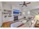Inviting living room featuring a fireplace, built-in bookshelves, and comfortable seating at 2269 Hartfords Bluff Cir, Mount Pleasant, SC 29466