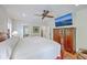 Bright main bedroom with king bed and a flat-screen TV at 2269 Hartfords Bluff Cir, Mount Pleasant, SC 29466