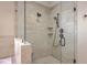 Modern shower features dual shower heads and frameless glass at 2269 Hartfords Bluff Cir, Mount Pleasant, SC 29466
