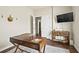 Bright bedroom with hardwood floors, a desk, and ample natural light, ideal for a functional workspace at 243 Old Savannah Dr, Goose Creek, SC 29445