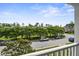 Scenic view from a balcony overlooking a street lined with trees and houses at 243 Old Savannah Dr, Goose Creek, SC 29445