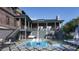 Stunning backyard with a private pool, lounge chairs, and well-maintained landscaping at 27 Rebellion Rd, Charleston, SC 29407