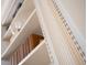Close up of built-in bookcase trim with stylish fluted edge at 286 Meeting St # C, Charleston, SC 29407