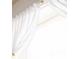 Bright natural light flowing in through a window dressed with sheer curtains at 286 Meeting St # C, Charleston, SC 29407