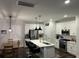 Modern kitchen with stainless steel appliances, white cabinets, and a large island at 31 Wedgepark Rd, Charleston, SC 29407