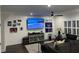 Cozy living room features a large sectional sofa, TV, ceiling fan, and modern decor at 31 Wedgepark Rd, Charleston, SC 29407