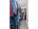 Walk-in closet with ample hanging space for clothes and shoe rack on the floor at 3202 Middleburry Ln, Charleston, SC 29414