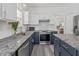 Stylish kitchen with stainless steel appliances, granite countertops, and modern cabinetry at 3202 Middleburry Ln, Charleston, SC 29414