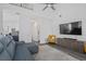 Stylish living room features a vaulted ceiling, modern fixtures, and convenient access to the kitchen at 3202 Middleburry Ln, Charleston, SC 29414