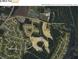 Overhead view of a residential neighborhood with nearby school, parks, and the Old Santee Canal State Park at 386 Spruce Ivy St, Moncks Corner, SC 29461