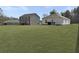 Expansive backyard featuring multiple homes at 386 Spruce Ivy St, Moncks Corner, SC 29461