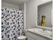 Bathroom featuring vanity, toilet, and shower with colorful curtain at 386 Spruce Ivy St, Moncks Corner, SC 29461