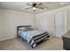 Cozy bedroom with a ceiling fan, carpeted floors and two closets at 386 Spruce Ivy St, Moncks Corner, SC 29461