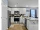 Well-lit kitchen featuring stainless steel appliances, ample counter space, and sleek finishes at 386 Spruce Ivy St, Moncks Corner, SC 29461