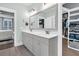 Bathroom with double vanity, large mirror, walk-in closet, and connecting bedroom at 467 Hidden Meadow Ln, Summerville, SC 29486